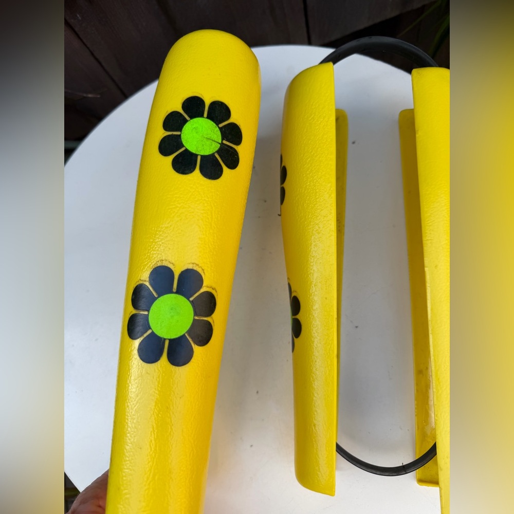 Vintage Mod yellow plastic pair of boot inserts or shapers power flowers decals.